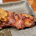 もつ焼き 丸松 - カレーをちょんと載せてみる