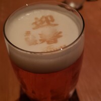 グランド キッチン - 生ビールには迎春の文字が