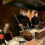 野口太郎 - 餅を炭火で