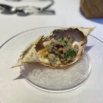 ウシマル - タカアシガニのリゾットを加え
