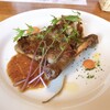 クッチーナ - 骨付きホロホロ鳥の薪窯焼き