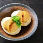 Special boiled egg topped with plenty of luxurious sea urchin