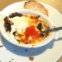 La Brianza - トリュフグラタンピエモンテ風イタリア産黒トリュフ。黄身色の濃い田中農園の健康卵、味わいも濃くとてもおいしい。お店の人気メニュー、何度いただいても飽きないおいしいおいしい♪