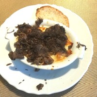 La Brianza - トリュフグラタンピエモンテ風イタリア産黒トリュフ。たっぷりの黒トリュフを削ってくださいました。豊潤な黒トリュフの香り、半熟卵やチーズソースと相性よくいつも美味☆