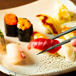 Various types of nigiri Sushi and thin rolls