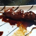 もつ焼き じんちゃん - ネギと焼かれたハラミ。噛むと肉汁がジュワーっと出てきます。
      