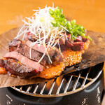 Thick-sliced Cow tongue grilled with hoba leaves