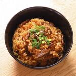 Nikumeshi (rice with meat and offal sauce)