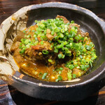 萬的中華 笑龍 - 牛スジの辛味煮込み。