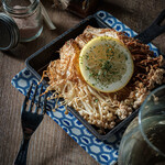 A single grilled enoki mushroom