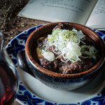 Tasty beef tendon tofu stew in red wine