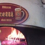 ピッツェリア エ トラットリア フォルティッシモ - ゞ(≧U≦)ゞ店内入口の窯の炎(’12.09月より)