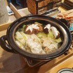 浅草じゅうろく - 蟹の出汁がでた土鍋に野菜を