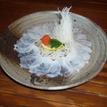 Taraku - 北海タコの薄造り　あっさりポン酢で召し上がっていただきます。