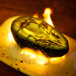 Grilled avocado with butter and soy sauce