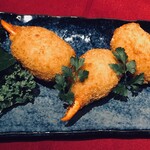 Bisque Croquette with lobster claws