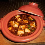 瀬里奈 - 麻婆豆腐です。コクと辛み、甘みのバランスが素晴らしい一品で魚沼産コシヒカリご飯とベストマッチです。
