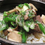 レストラン バカール - 牛ほほ肉と九条葱の鉄鍋ご飯、ポルチーニのスープで  パルミジャーノチーズとファイブペッパーソルトをお好みで2