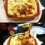 ずぼら - 1Fで人気の鶏とトマトのチーズ焼き