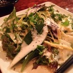 沖縄 肉酒場 ぬちぐすい - 宮古野菜のシーザーサラダ
            