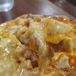 輝珍楼 - トロけるチーズをたっぷり使っています。