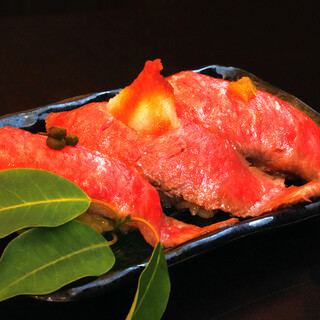 The flavorful red vinegar sushi rice complements the A5 Hida beef nigiri.