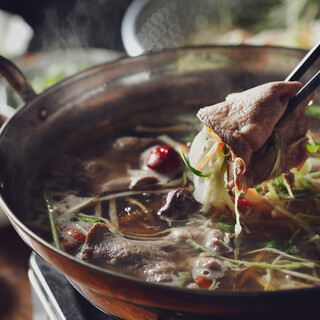 Popular Medicinal Food `` Cow tongue hotpot'' or ``Pork belly hotpot''