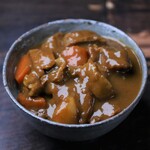 Bowl of beef tendon curry