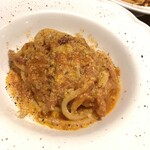“Amatriciana” bucatini with guanciale and onions in spicy tomato sauce