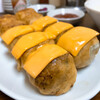 少林餃子 - 10個定食 970円﻿
ギョーザ10個、ライス、玉子スープ、漬物﻿
﻿トッピング﻿ チーズ（6個分） 150円﻿