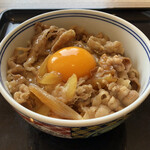 Yoshinoya - 卵黄だけのっけます。