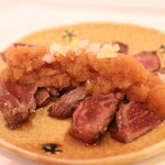 Grated skirt steak topped with ponzu sauce