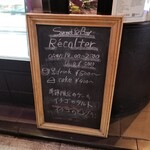 リコルティ - 店頭の案内板