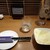 朝霞 日本酒バル まいかけ - お通しのチーズ
