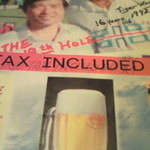 SUSHI BAR よし八 - 店主とタイガーウッズとの写真が表紙