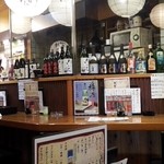 だんだん - 焼酎が並ぶ