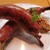 ワイルドバーン - ワイルドリブフランク・・・ブリッと肉汁飛び出すリブフランク。ビールに間違いなく合いますね(笑) 気分はジャーマニー！(笑)