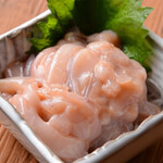 Shiokara prepared in a wooden barrel