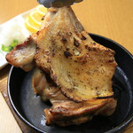 Delicious grilled bone-in thigh meat