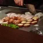 吉向 - シーフードを調理