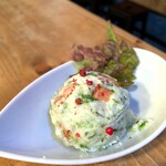 Potato salad with bacon and chopped wasabi