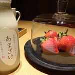 ガンツウ - 夕食後部屋にはフルーツが有りました。冷蔵庫に入っていた甘酒と共に・・・