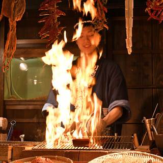 Straw-grilled bonito bonito grilled over charcoal in the restaurant's hearth