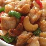 Stir-fried chicken and cashew nuts in oil