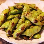 Grilled edamame with garlic butter and soy sauce