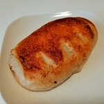 たま木亭 - 原木の手切りベーコンにブラックペッパーをからめ、口溶けの良いもち感のある生地で包んだ、ベーコンハース237円