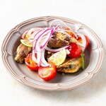 Citrus marinade of oil sardines and rich tomatoes