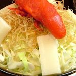 海鮮もんじゃ 片岡 - 丸ごと一本！明太子もんじゃにおもちをトッピング。 これにチーズをプラスしてお召し上がりください。