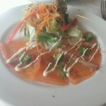 ウマコシ - 前菜部門からサーモンのカルパッチョ