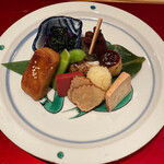 もちづき - 八寸～ハリハリ、新じゃがの田楽味噌、煮蛸、バイ貝、キンジソウのお浸し、枝豆、お麩の照焼き、赤こんにゃく、いぶりがっこ、チーズ豆腐の味噌漬け